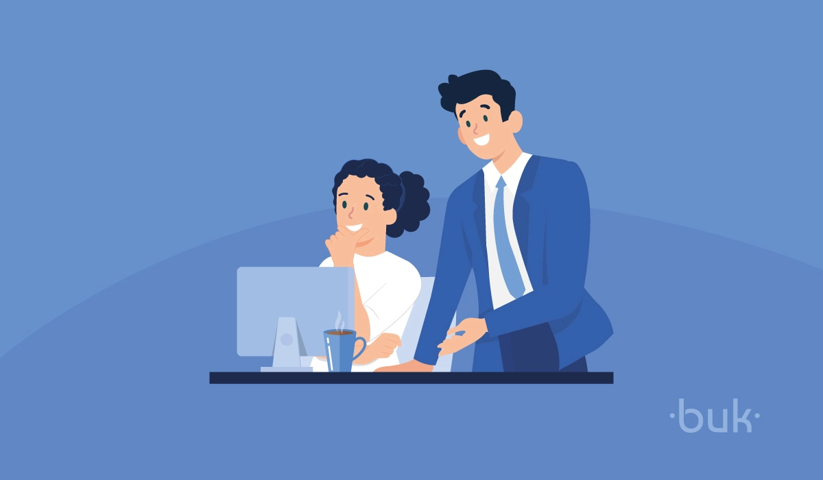 Ilustración sobre dos personas frente a un computador en una sesión de mentoring
